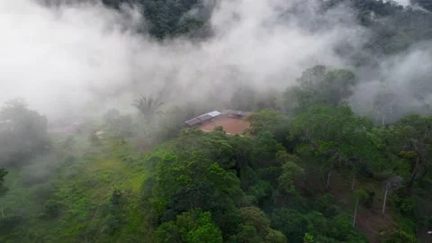 Clouds Passing Over an Isolated Hilltop House in the Amazon Stock Footage 344061365