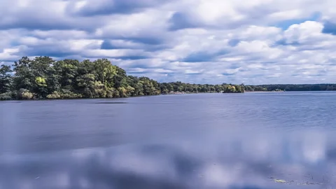 Clouds Passing Over Lake Landscape - time lapse Stock Footage 139247481