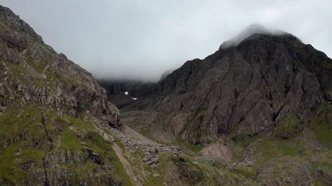 Clouds passing over mountain peak in Scotland while camera beeing still Stock Footage 116041961