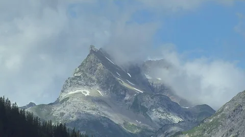 Clouds Passing over a mountain top Stock-Footage 53237871