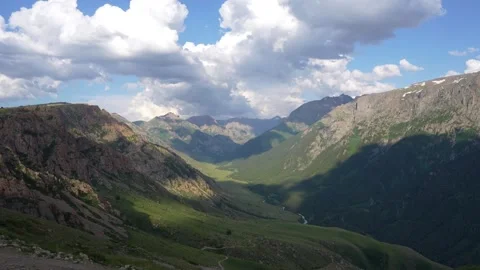 Clouds passing over mountain valley in altai republic Video stock 313257195