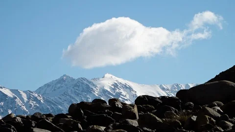 Clouds passing over the mountains Stock Footage 106303302