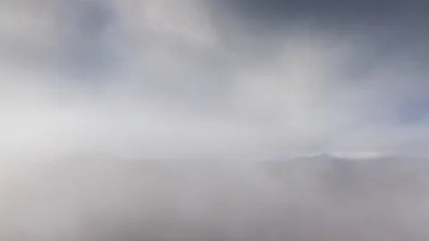 Clouds passing over mountains time lapse Stock Footage 116822400
