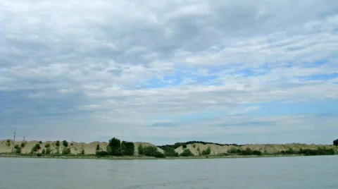 Clouds passing over river 库存影片 156309