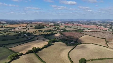 Clouds passing over rolling fields Stock Footage 315282590