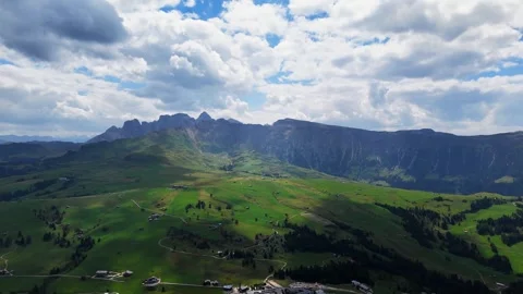Clouds passing over seceda mountain and italian alps Video stock 284985380