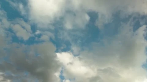 Clouds passing by in the sky at the normal speed Stock Footage 138162415