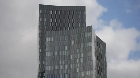 Clouds passing skyscrapers in Deansgate Square, Manchester, Lancashire, England Stock Footage 273939346