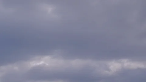 Clouds passing time-lapse close zoomed in Stock Footage 111605239