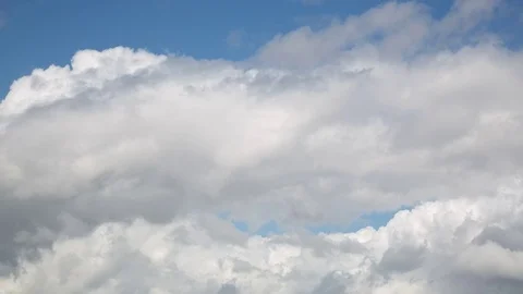 Clouds Passing Under a Blue Sky Video stock 76853175
