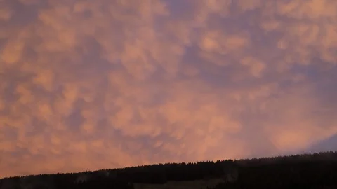 Clouds passing while dusk during colorful sunset. Stock Footage 90533177