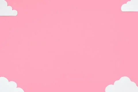 Clouds on a pastel pink background. Concept greeting card, poster. Stock Photos