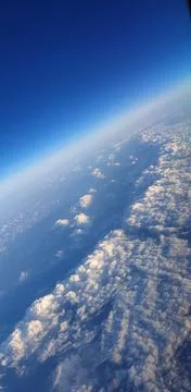Clouds from the plane window Stock Photos