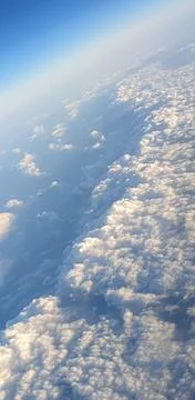 Clouds from the plane window Stock Photos