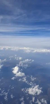 Clouds from the plane window Stock Photos
