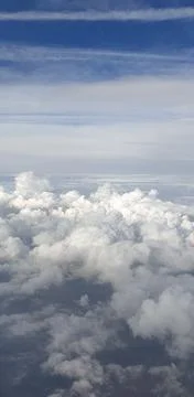 Clouds from the plane window Stock Photos