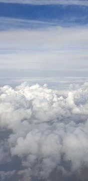 Clouds from the plane window Stock Photos