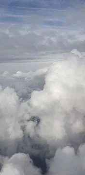 Clouds from the plane window Stock Photos