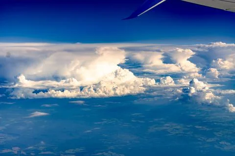 Clouds from the plane window Stock Photos