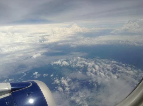Clouds from plane window. Stock Photos