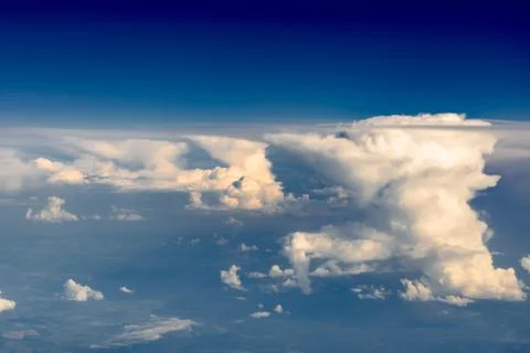 Clouds from the porthole. Stock Photos