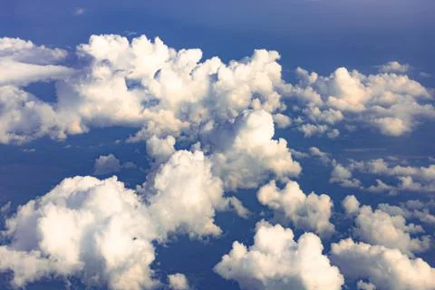 Clouds from the porthole. Stock Photos