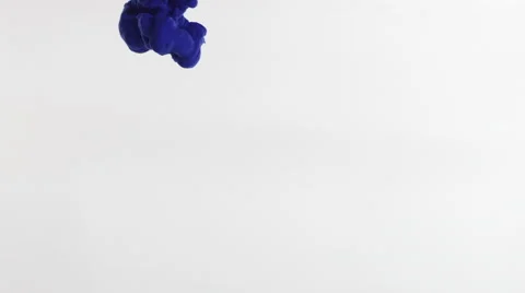Clouds of purple and pink ink plume downward in clear liquid over white. Stock Footage 64893477
