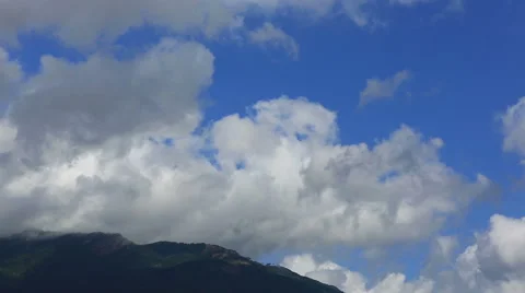 Clouds quickly float over the low mountain Stock Footage 47745227