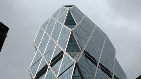 Clouds racing across the Hearst Tower, New York, US Stock Footage 132337098