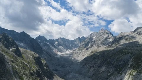 Clouds Racing Over Rugged Glacier Cirque Near Vicosoprano Switzerland Stock Footage 345780787