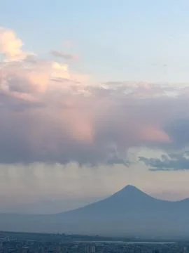 Clouds with rain, clouds over the city, rain in the clouds, bad weather Stock Photos