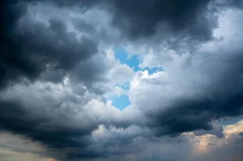 Clouds of rain on the sky began to form before falling Stock Photos