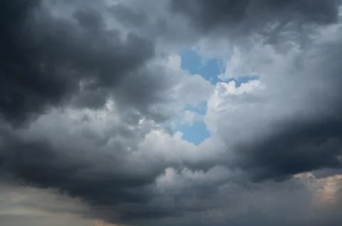 Clouds of rain on the sky began to form before falling Stock Photos