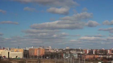 Clouds rapidly fly over the city Stock Footage 48266508