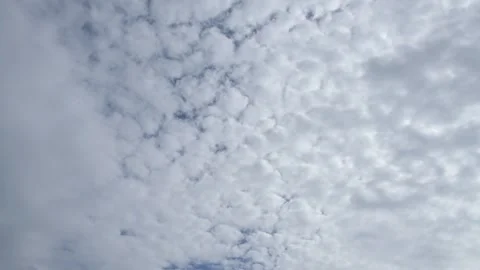 Clouds Real time lapse of multi layered fluffy clouds crossing the sky - 03 Stock Footage 132043521