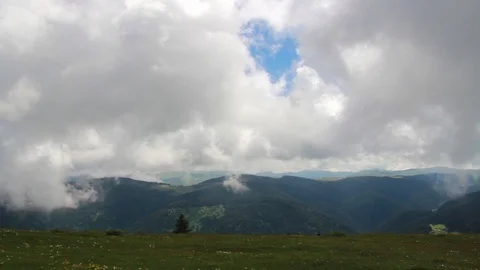 Clouds real time nature green mountain Stock Footage 108190993