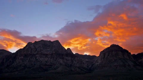 Clouds red fire sunset mountain 1 Stock Footage 34932191