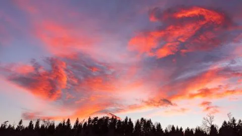 Clouds red orange blue and violet color sunset dramatic sky background Stock Photos