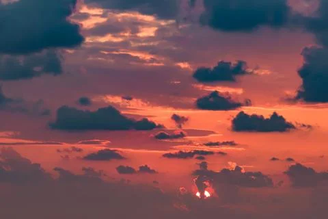 Clouds on the red sky during sunset Stock Photos