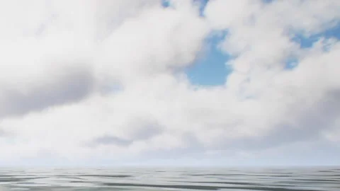Clouds reflect on calm water near the horizon during daylight Stock Footage 340222055