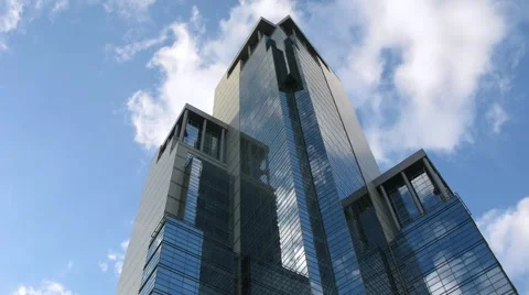 Clouds reflect in newly build skyscraper Stock Footage 1045937