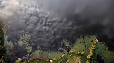 Clouds reflected on calm Lake Stock Footage 65445270