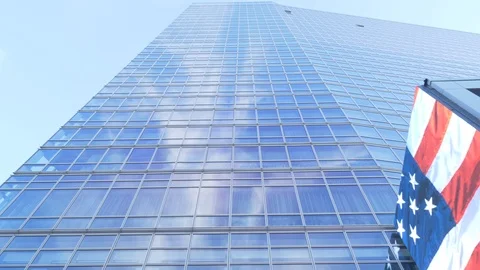 Clouds Reflected in John Hancock Tower Windows with American Flag Billboard Stock Footage 92648322