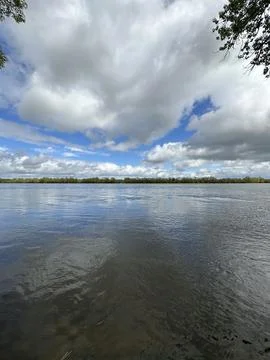Clouds reflected at Loire river in the Loire valley in France, Europe Stock Photos