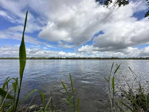 Clouds reflected at Loire river in the Loire valley in France, Europe 写真素材