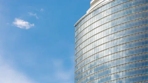 Clouds reflected in mirrored building Stock Footage 61968589