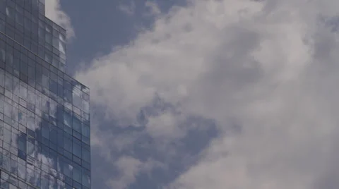 Clouds reflected in side of building, timelapse Stock Footage 33835434