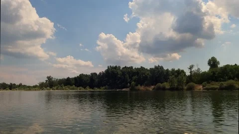 Clouds reflected in water Stock Footage 214874707
