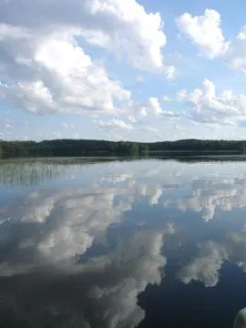 Clouds reflected in water Stock Photos
