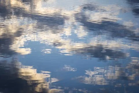 Clouds reflected in the water. Stock-Fotos